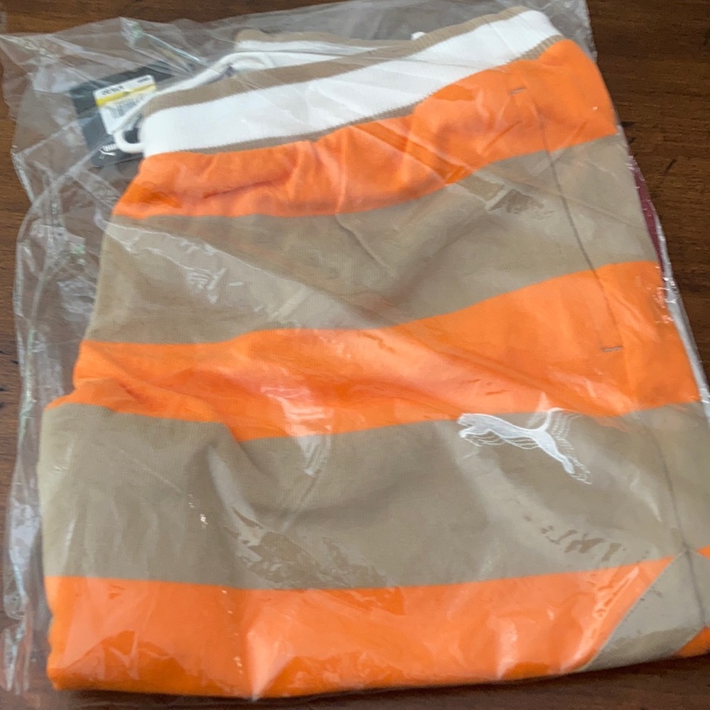 Brand new freedom short vibrant orange, limited release puma event.